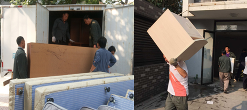 加班加点搬运家具的后勤员工 加班加点搬运家具的后勤员工